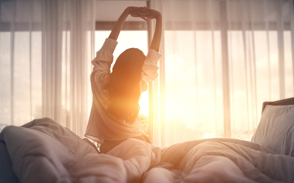 Woman bed stretching